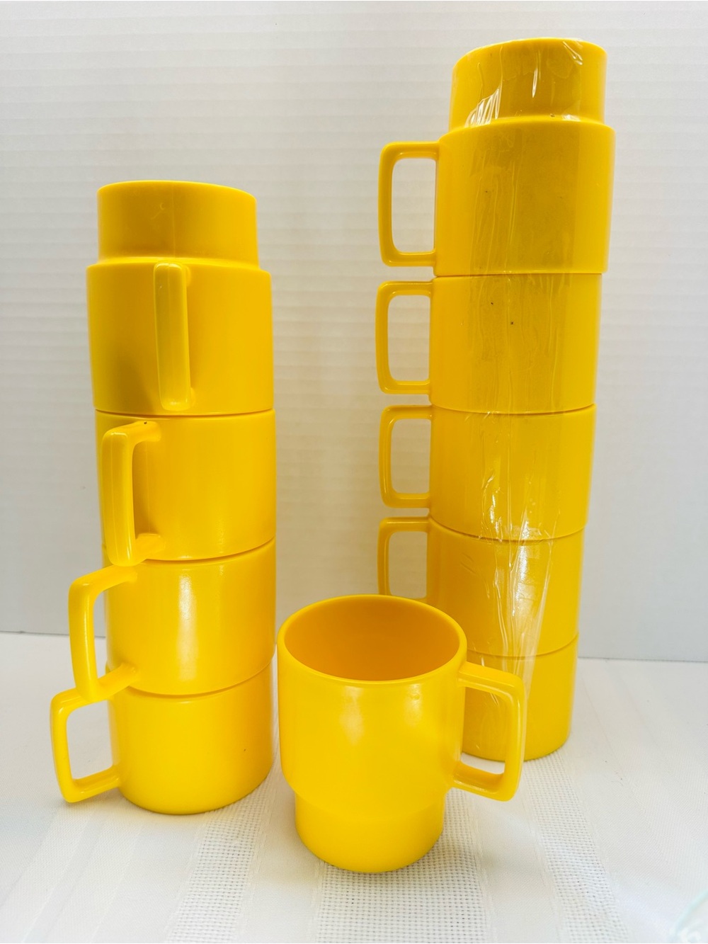 10 yellow 1970’s Melamine stackable camping mugs.